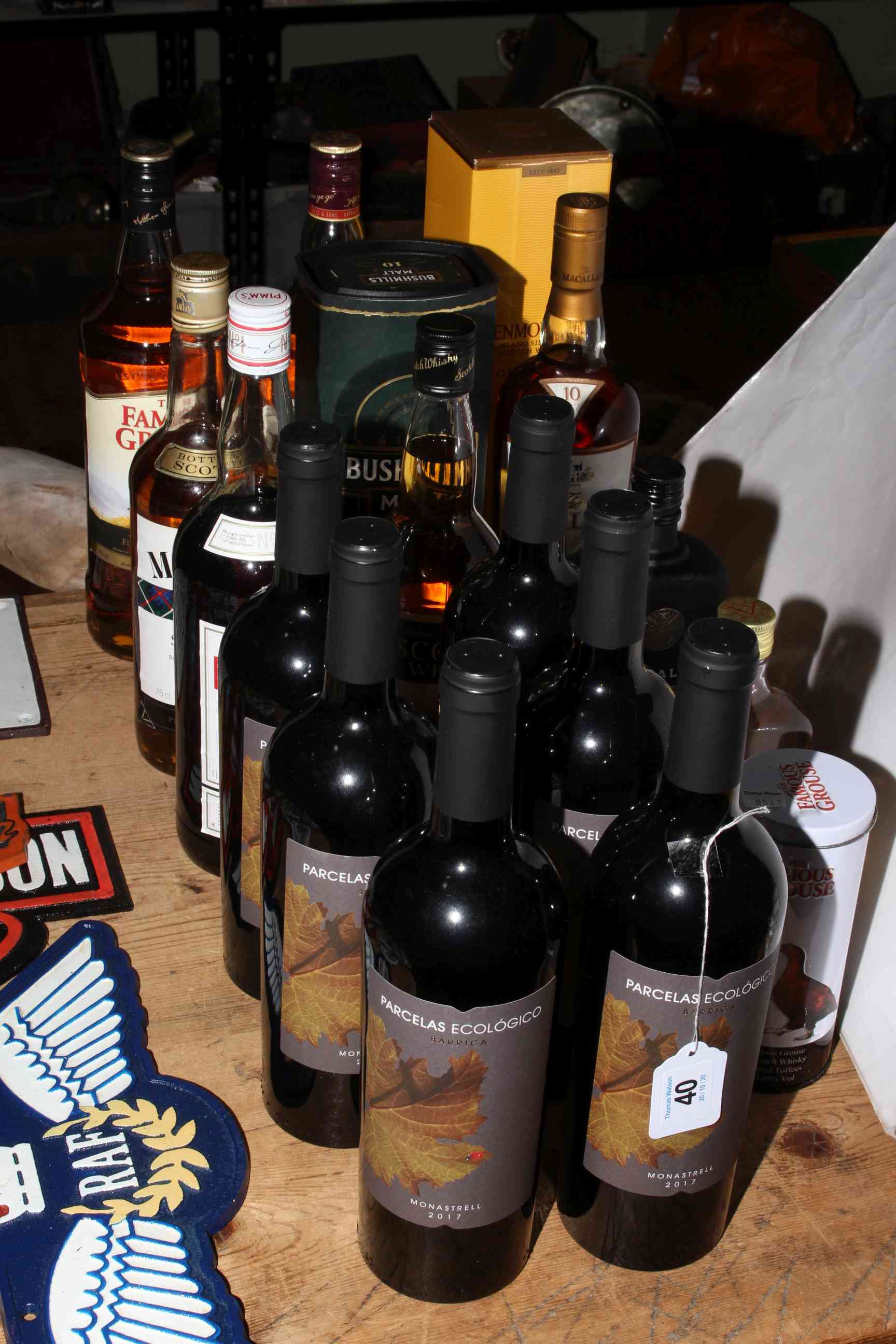Seventeen bottles of spirits and red wine including The Macallan single malt, Bushmills single malt,