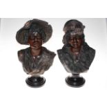 Pair of busts of children, mounted on wood plinths, 45cm and 47cm.