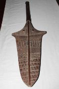 Fijian Kinikini paddle club with carved decoration, length 111cm.