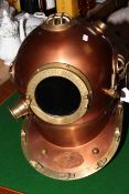 Copper divers helmet, 40cm height.