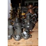 Brass candlesticks, one gallon copper jug, pewter teapots, tankards, etc.