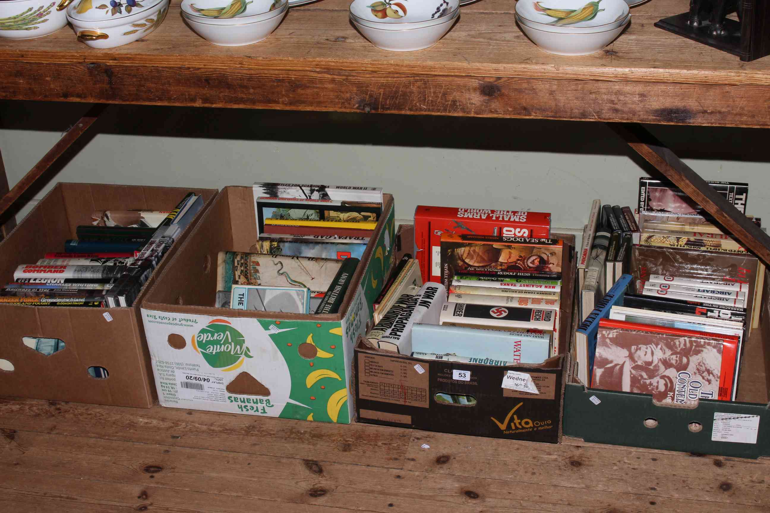 Four boxes of military books.