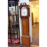 Antique oak, mahogany and chequer inlaid eight day longcase clock having painted arched dial,