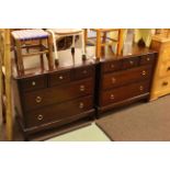 Pair Stag Minstrel five drawer chests.