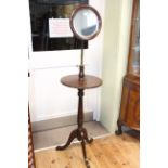 Mahogany tripod vanity stand with adjustable mirror.