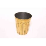 Polished bronze fluted beaker.