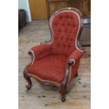 Victorian style mahogany framed gents chair in buttoned fabric.