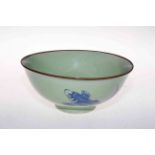 Chinese bowl decorated with blue carp on green ground, 21.5cm diameter.