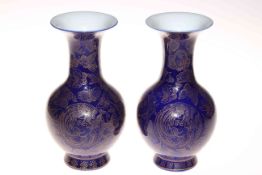 Pair Chinese vases having gilt line decoration of butterflies on blue ground, seal mark to base, 23.