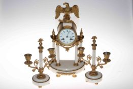 Gilt metal and onyx three piece clock garniture,