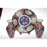 Large 19th Century Imari charger, 37cm diameter, and pair of Imari vases (3).