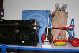 Vintage child's bicycle, spinning top, hoover, kites and a metal trunk.