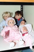 Collection of five Gotz dolls.