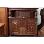 Large oak buffet sideboard, having carved and moulded front cupboards and drawers, 1.72m wide, 1.