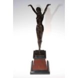 Art Deco bronze lady in a dancing pose, on marble plinth, 54cm high.
