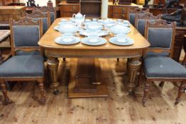 Victorian oak wind-out extending dining table with two leaves; together with six dining chairs,