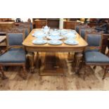 Victorian oak wind-out extending dining table with two leaves; together with six dining chairs,