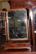 Mahogany toilet mirror above two drawers on bracket feet, 85cm high.