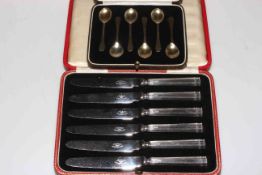 Cased set of silver gilt coffee spoons and cased set of silver handled tea knives (2).