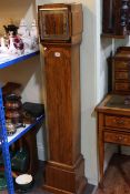 Art Deco walnut grandmother clock with striking movement.