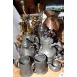 Antique copper gallon measure, brass candlesticks, Britannia metal and pewter pieces.