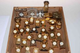 Collection of miniature clocks.