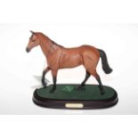Beswick 'Red Rum' figurine on wooden stand, 1988, 23cm high, with box.