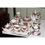 Royal Albert Old Country Roses tea and coffee sets, forty pieces.