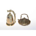 Oriental brass teapot and bell.