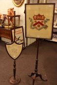 Victorian needlework and mahogany pole screen and shield shaped and mahogany pole screen.