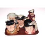 Collection of five Royal Doulton character jugs including Falstaff and Golfer.