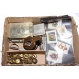 Box with military silks, buttons, etc.