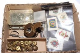 Box with military silks, buttons, etc.