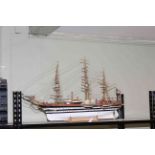 Wooden model of a sailing ship.
