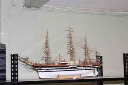 Wooden model of a sailing ship.