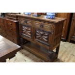 Oak side cabinet with drawers above cupboards, 1.25m wide, 1.11m high and 0.45m deep.