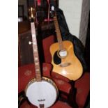 Westfield acoustic guitar and banjo with cases.