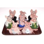 Eight Wade Nat West piggy banks.