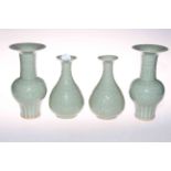 Two pair of Chinese green celadon glaze vases, 24cm and 20cm high.