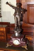 Spelter farmer figure mantel clock on marble base with gilded feet, 79cm.