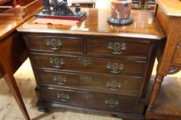 Mahogany crossbanded four height chest, 84cm wide.