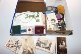 Two boxes with coins, postcards, etc.