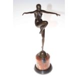 Art Deco bronze lady figure in a dancing pose on marble plinth, 56cm high.