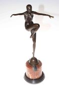 Art Deco bronze lady figure in a dancing pose on marble plinth, 56cm high.