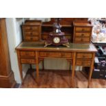 Edwardian inlaid writing desk with superstructure arrangement of drawers, 122cm wide, 62cm deep,