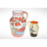 Clarice Cliff Pine Grove pattern jug, circa 1930, 16cm high, and a modern Clarice Cliff jug,