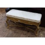 Giltwood duet stool on cabriole legs.