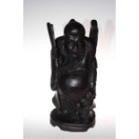 Large carved wood figure on an Oriental elder, 47cm high.