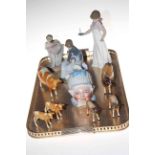 Beswick cows and calves, three Nao figures and baby storage jar.