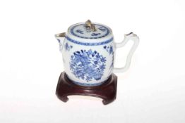 18th Century blue and white teapot on wood stand.